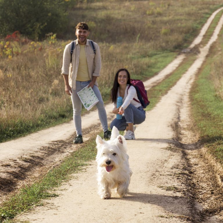 full-shot-happy-couple-with-dog